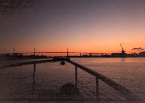 Westgate bridge approached at Sunset from the Yarra River, Melbourne, Victoria, Australia